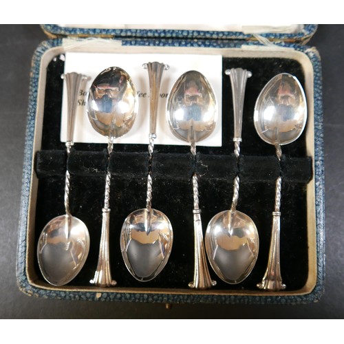 34 - A Georg Jensen sterling silver spoon 16.5 cm long, a boxed set of six silver coffee spoons, a coin p... 