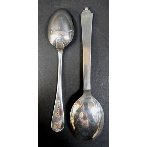 34 - A Georg Jensen sterling silver spoon 16.5 cm long, a boxed set of six silver coffee spoons, a coin p... 