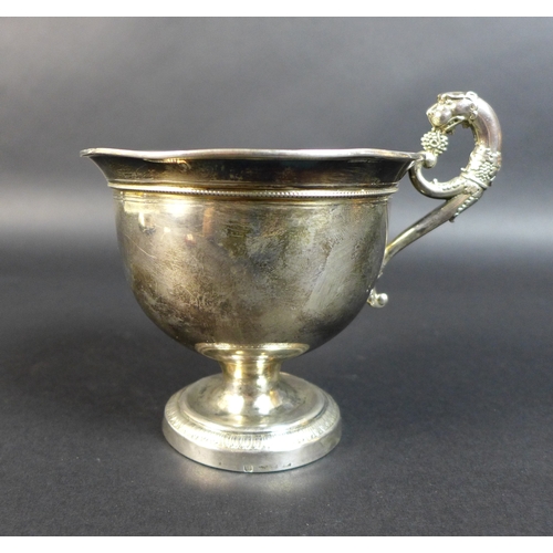 14 - An early 19th century French silver cup, with single panther's head form handle and single stem circ... 