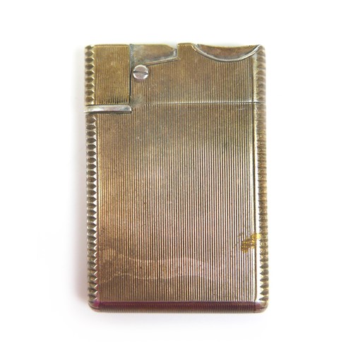 66 - An Asprey and co Ltd silver wafer petrol lighter, London 1953/54, 37 by 58 by 6mm.