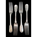 Four George III silver fiddle pattern table forks, with armorial crests, William Eley I, William Fea... 