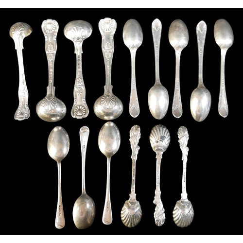 46 - A collection of William IV and later spoons, including Kings pattern condiment spoons, one London 18... 