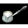 A George III silver brandy pan, with turned ebony handle,  London 1771, 5.5toz gross, 19 by 8.5 by 1... 