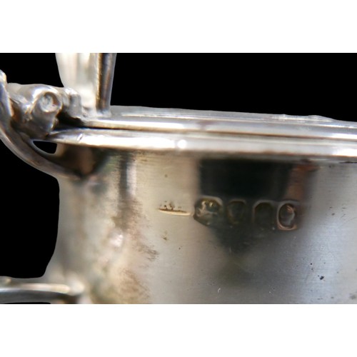 58 - Four William IV and later matched silver mustard pots, including one William IV example, rubbed armo... 