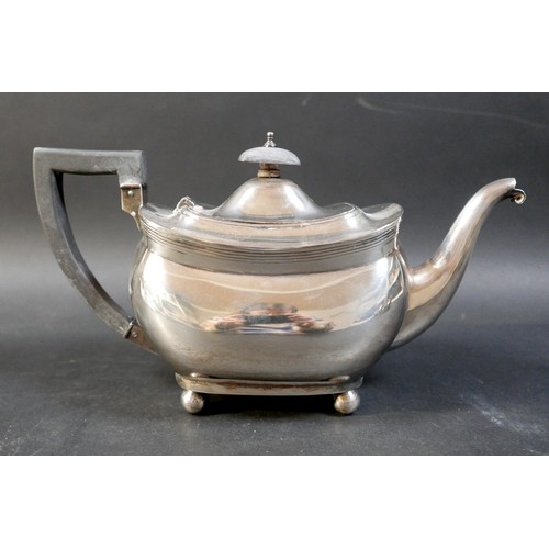 69 - A silver three piece tea set, comprising teapot, sugar bowl, and milk jug, Barker Brothers, Chester ... 