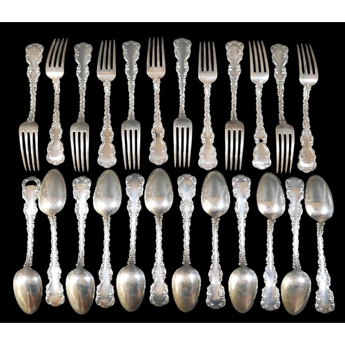 72 - A set of twenty-four pieces American Louis XV pattern silver flatware,  comprising twelve dessert fo... 