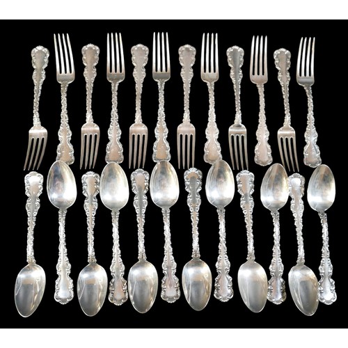 72 - A set of twenty-four pieces American Louis XV pattern silver flatware,  comprising twelve dessert fo... 