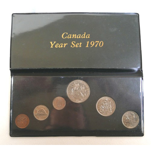 81 - A collection of thirteen Canadian silver coins, 227g total, together with two Canadian proof sets, a... 