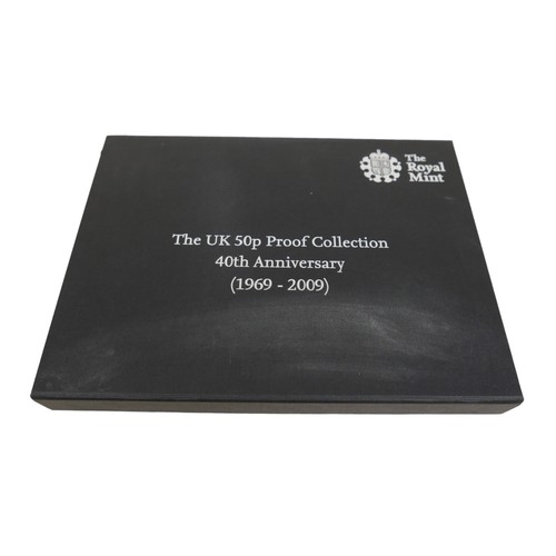 97 - A Royal Mint 40th anniversary (1969-2009) UK 50p proof collection of sixteen coins, including Kew ga... 