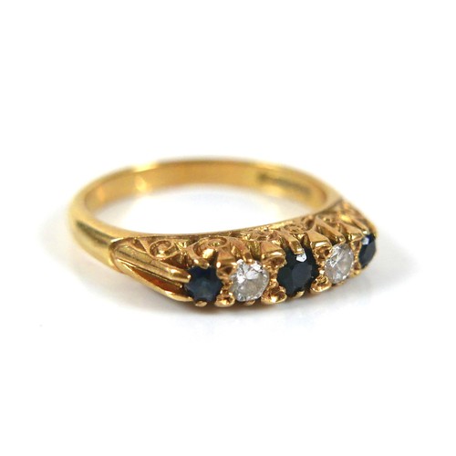 225 - Two 18ct gold dress rings, comprising a diamond and blue sapphire ring, largest stone a sapphire, 2.... 