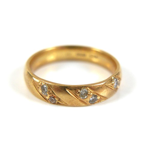 225 - Two 18ct gold dress rings, comprising a diamond and blue sapphire ring, largest stone a sapphire, 2.... 