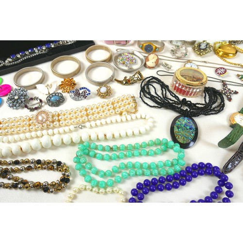 164 - A large collection of assorted costume jewellery, including necklaces, brooches, earrings, bracelets... 