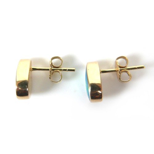 251 - A pair of 14k yellow gold earrings, set with pear shaped opals, in rub-over settings, post fittings,... 