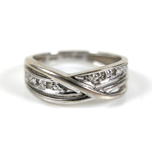 184 - An 18ct white gold and diamond crossover ring, size I, 3.0g.