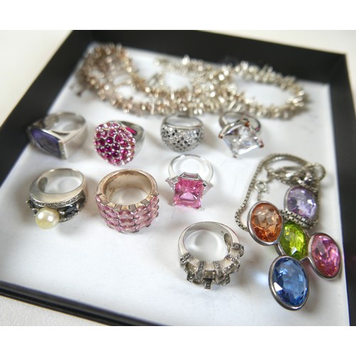 229 - A collection of 925 silver and white metal jewellery, including rings and necklaces, in three boxes.... 