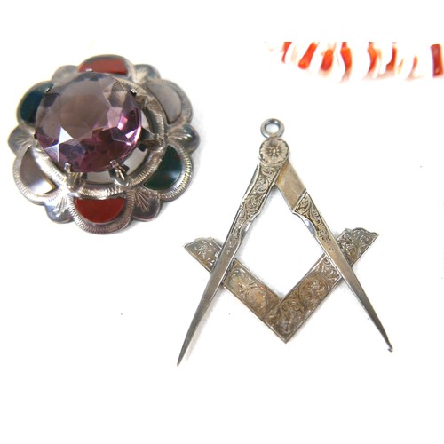 156 - Two silver Scottish design brooches, a white metal Masonic pendant, and assorted costume jewellery. ... 