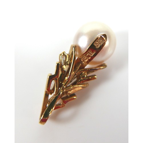 256 - A pair of 14ct yellow gold bark effect clip earrings, a pair of 14ct pearl earring, and a 14ct gold ... 