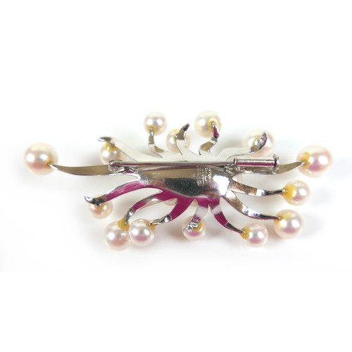 257 - A 14ct white gold multi branch pearl brooch, marked CECIL, 70 by 35mm, 15.8g.