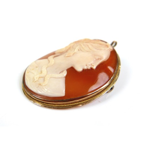 143 - A cameo brooch pendant in a 9ct yellow gold mount, 35 by 45mm, 11.2g.