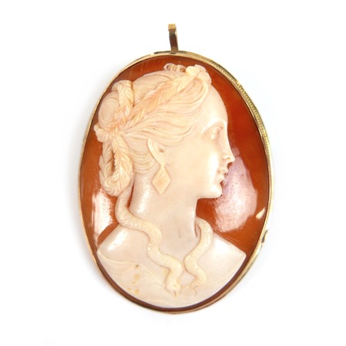 143 - A cameo brooch pendant in a 9ct yellow gold mount, 35 by 45mm, 11.2g.