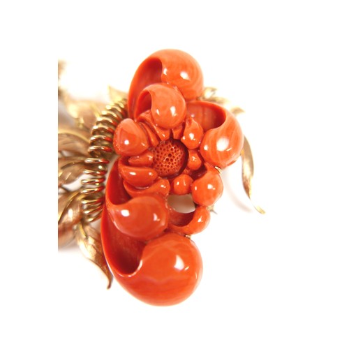 303 - A 14ct yellow gold coral brooch, carved as a flower, 90mm by 55mm, 52.3g.