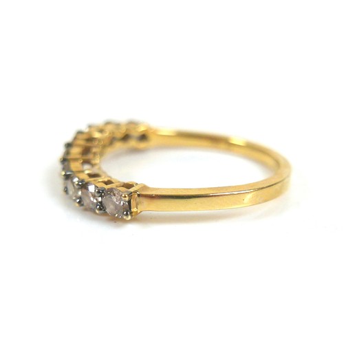 177 - An 18ct gold nine stone diamond ring, each round cut stone approximately 2.5mm diameter, size N, 2.8... 