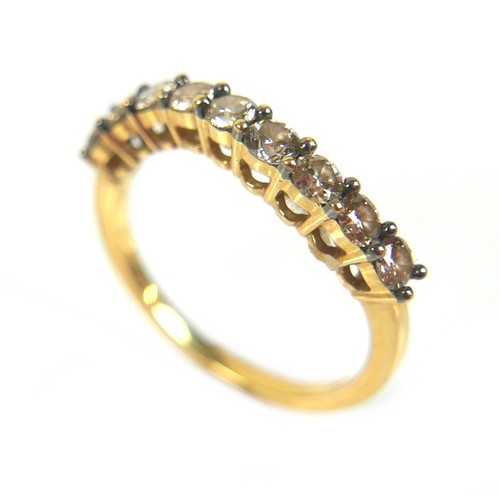 177 - An 18ct gold nine stone diamond ring, each round cut stone approximately 2.5mm diameter, size N, 2.8... 