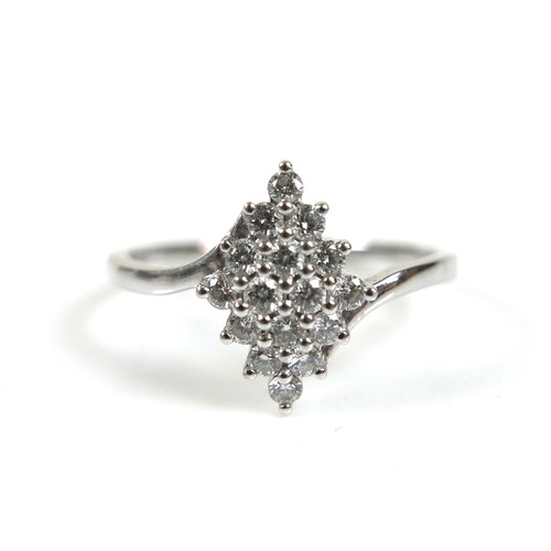 178 - A platinum and diamond cluster ring, round cut stones, each 1.5mm, size O, 3.2g.