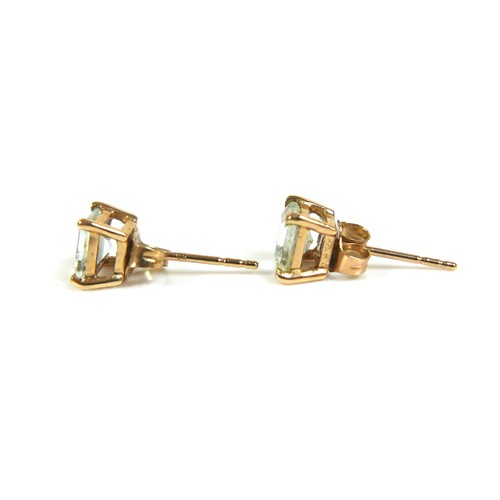 167 - A pair of 9ct gold aquamarine stud earrings, square cut stones approximately 5mm by 5mm, 1.2g, with ... 