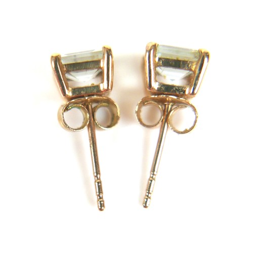 167 - A pair of 9ct gold aquamarine stud earrings, square cut stones approximately 5mm by 5mm, 1.2g, with ... 