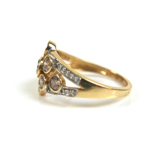 216 - Two 9ct gold dress rings, comprising a diamond cluster ring, largest round cut cetnral stone approxi... 