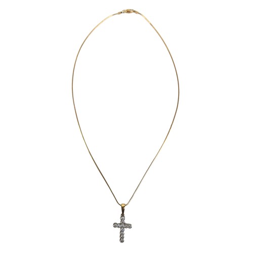 297 - An 18ct white and yellow gold diamond set cross shaped pendant, by Pascal at Harrods, the cross set ... 