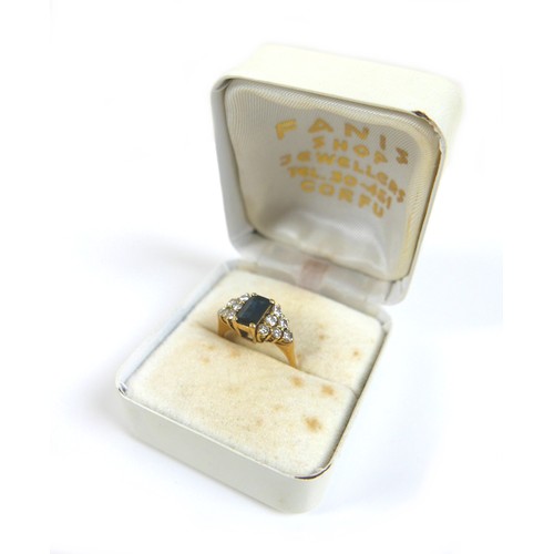 246 - An 18ct gold, sapphire and diamond ring, circa 1986, the central square cut sapphire, 7.8 by 4.5 by ... 