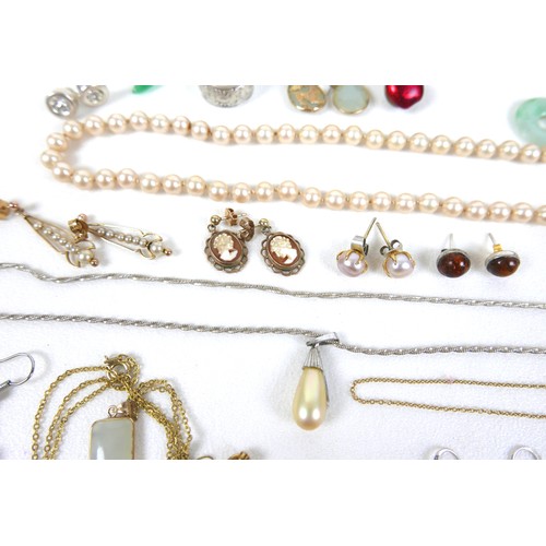 193 - A small group of costume jewellery, including some gold and silver, a 9k gold floral pendant set wit... 