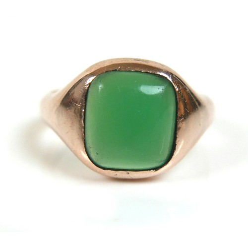 179 - An Edwardian 9ct yellow gold signet ring, set with a rectangular cabochon green stone, 11 by 10mm, 1... 