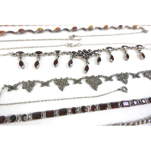 148 - A group of costume jewellery, including a two strand pearl necklace, a silver flowerhead filigree br... 