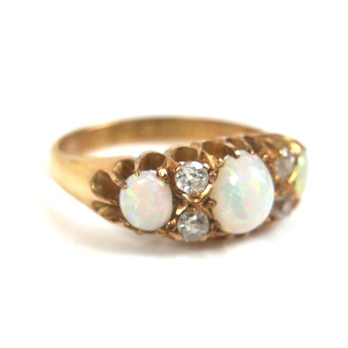 264 - An 18ct yellow gold, diamond and opal ring, set with three oval cabochon-cut opals, largest 6.5 by 5... 