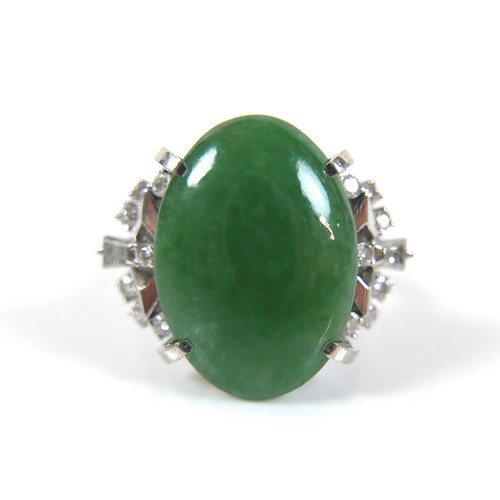 295 - An Art Deco style platinum, jade and diamond ring, head size approximately 22 by 18mm, size L, 10.0g