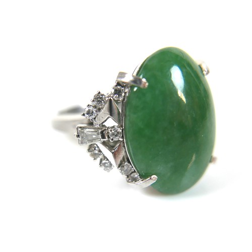 295 - An Art Deco style platinum, jade and diamond ring, head size approximately 22 by 18mm, size L, 10.0g