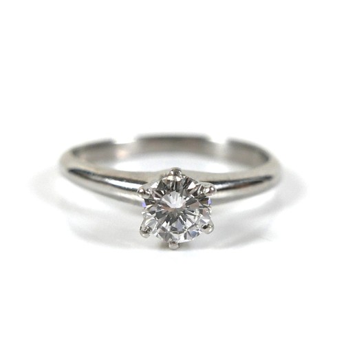 283 - A platinum and diamond solitaire ring, the round brilliant cut stone approximately 0.45ct, stamped t... 