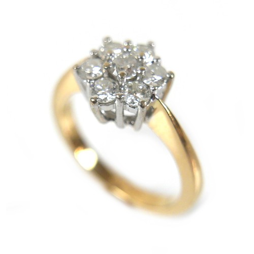 275 - An 18ct yellow gold seven stone diamond cluster ring, approximately 0.5ct total, marked .50 DIA to i... 