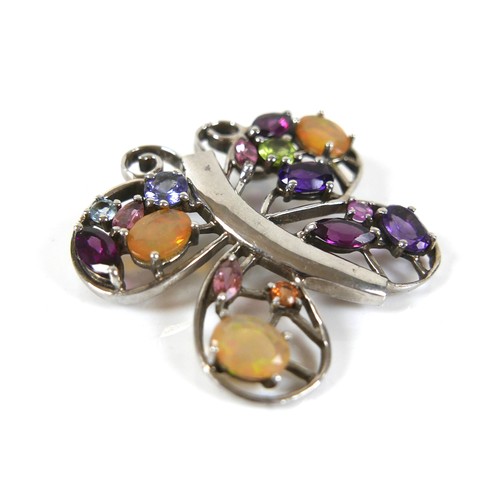 142 - A vintage 925 silver multi gem pendant, in the form of a butterfly, 42 by 38mm.