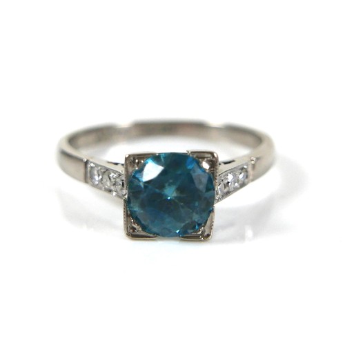 228 - An 18ct white gold and platinum, blue topaz and diamond ring, head size 7 by 7mm, set with diamond s... 