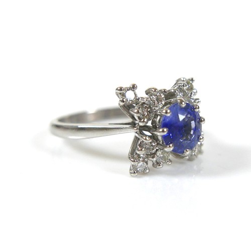 290 - An Art Deco style platinum, blue sapphire and diamond ring, head size 12 by 12mm, size M.