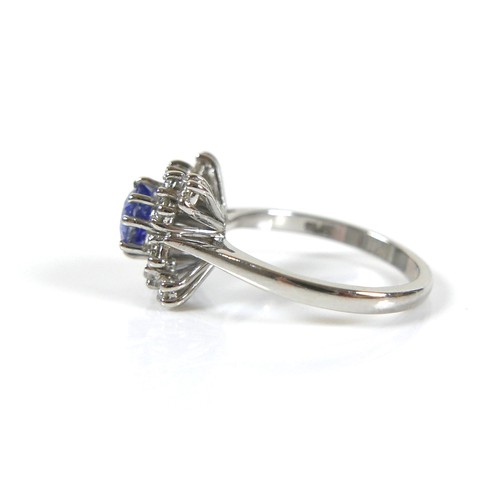 290 - An Art Deco style platinum, blue sapphire and diamond ring, head size 12 by 12mm, size M.