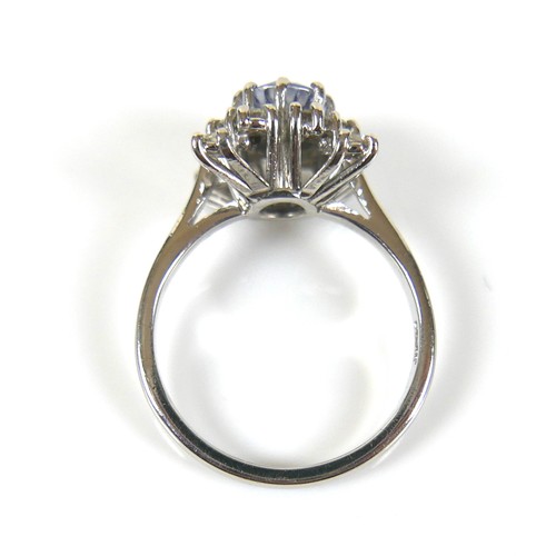 290 - An Art Deco style platinum, blue sapphire and diamond ring, head size 12 by 12mm, size M.