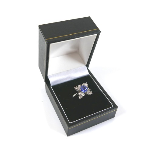 290 - An Art Deco style platinum, blue sapphire and diamond ring, head size 12 by 12mm, size M.