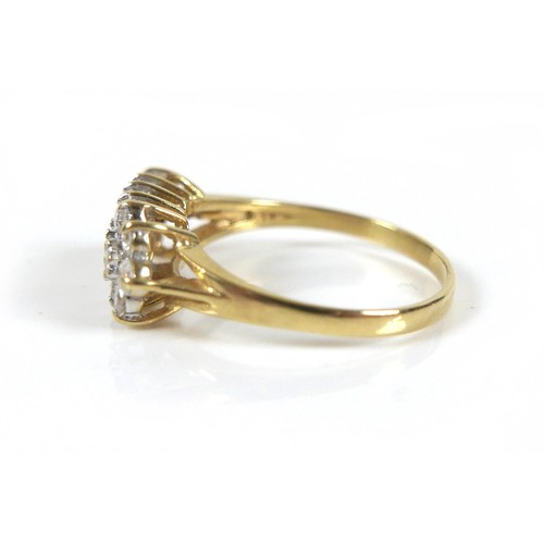 277 - An 18ct yellow gold three row diamond ring, head approximately 16 by 8mm, ring size N/O, 2.8g.