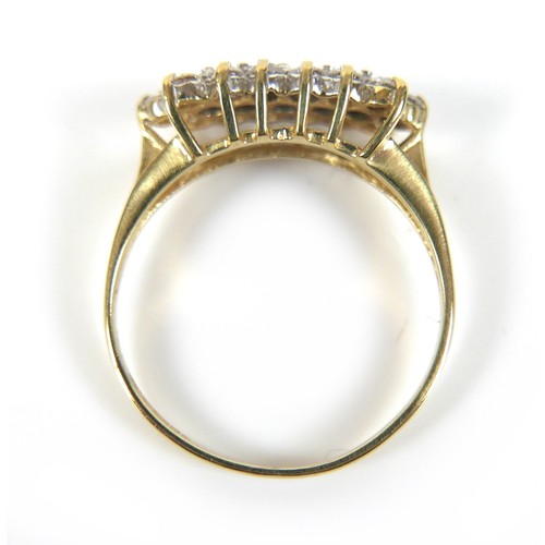 277 - An 18ct yellow gold three row diamond ring, head approximately 16 by 8mm, ring size N/O, 2.8g.