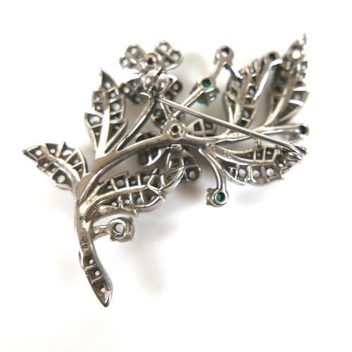 150 - Two vintage silver floral and foliate spray brooches, the larger silver gilt with articulated joints... 